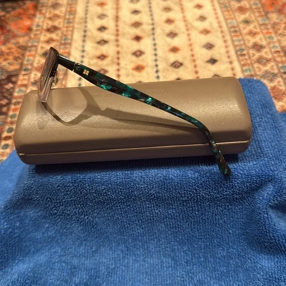 BCBG Green-Black metal frames with case. Currently has 